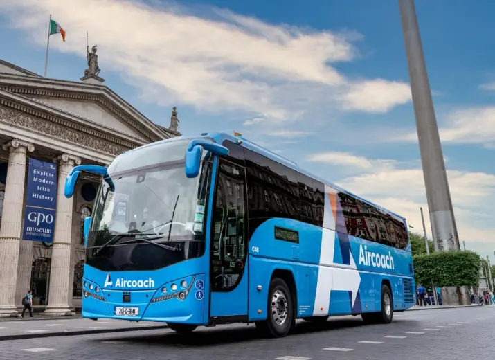 A photo of the aircoach driving through Dublin
