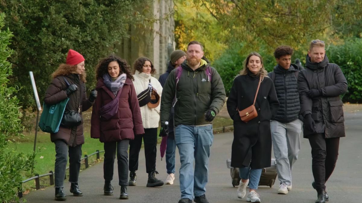 Local Dublin guide leading travellers through Temple Bar on the Essential Dublin Tour.